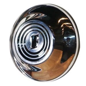 A chrome knob with a spiral design on it.