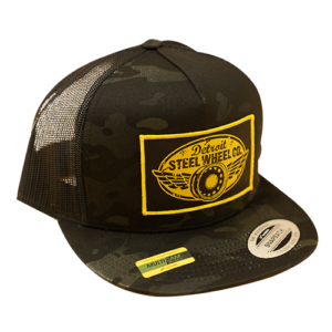 A black and yellow hat with a patch on it