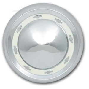 A chrome plated wheel cover with white trim.