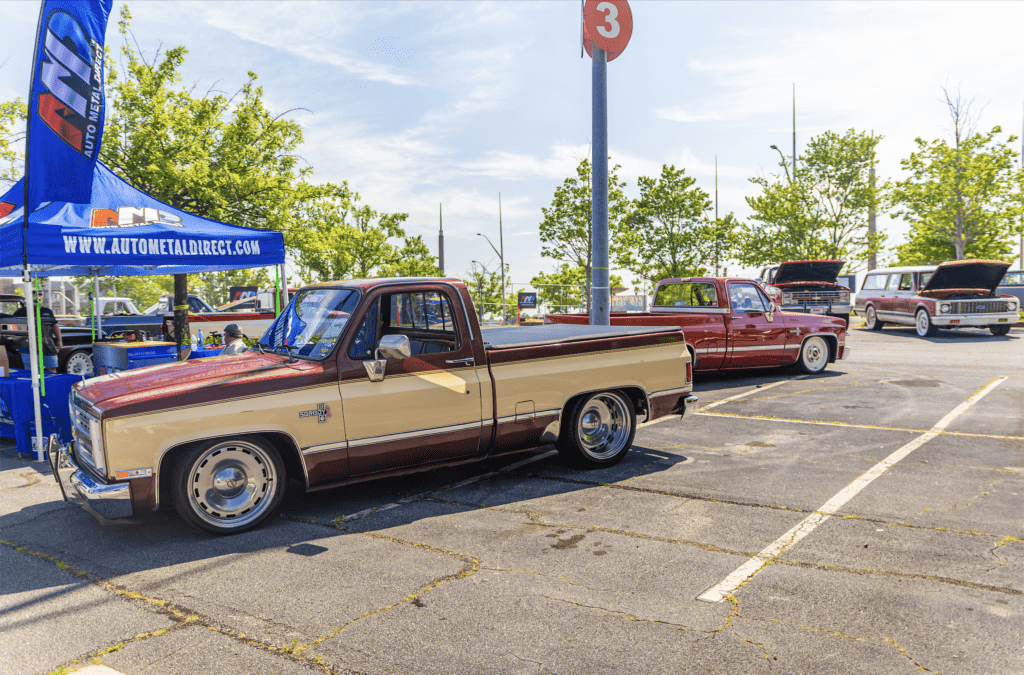 A couple of trucks parked in the parking lot